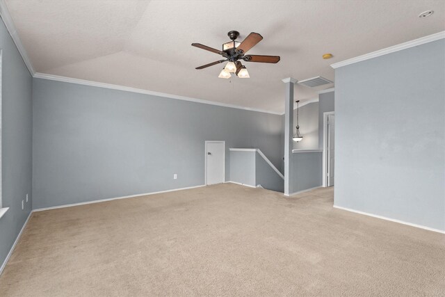 1910 Serenata Ln, Humble, TX 77396 - carpeted spare room featuring a ceiling fan, crown molding, and baseboards