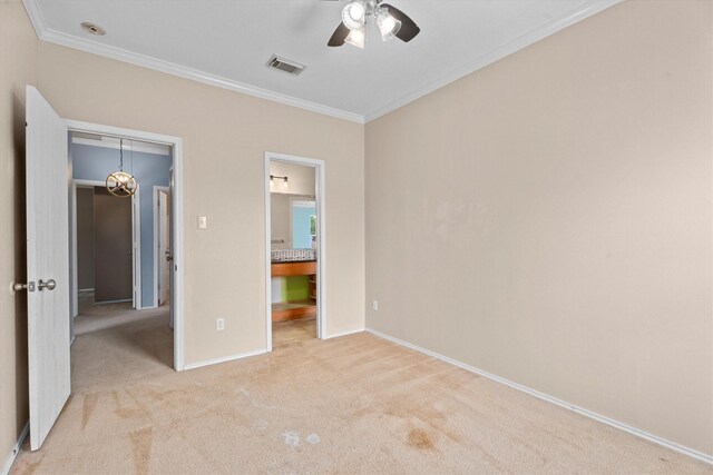 1910 Serenata Ln, Humble, TX 77396 - unfurnished bedroom featuring ornamental molding, light carpet, baseboards, ensuite bathroom, and a ceiling fan