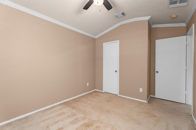 1910 Serenata Ln, Humble, TX 77396 - unfurnished bedroom featuring vaulted ceiling, carpet, baseboards, crown molding, and ceiling fan