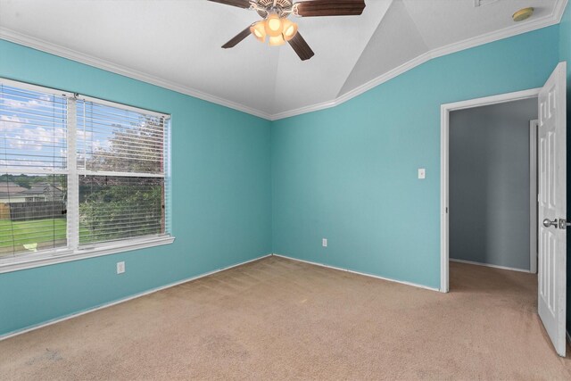 1910 Serenata Ln, Humble, TX 77396 - carpeted empty room featuring lofted ceiling, ornamental molding, a ceiling fan, baseboards, and a smoke detector