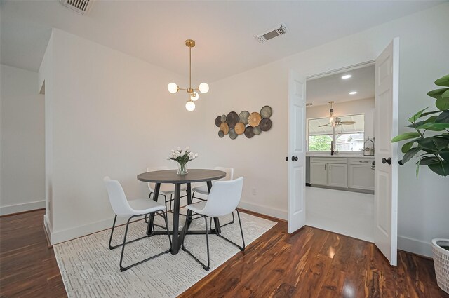 5615 Haven Point Dr, Houston, TX 77084 - dining room featuring dark wood-style floors and baseboards