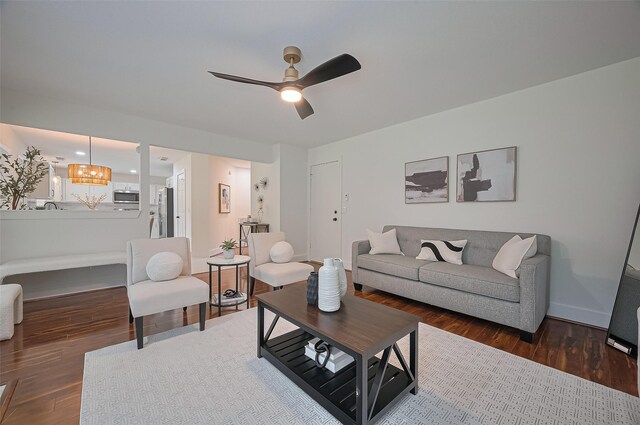 5615 Haven Point Dr, Houston, TX 77084 - living room featuring wood finished floors, ceiling fan, and baseboards
