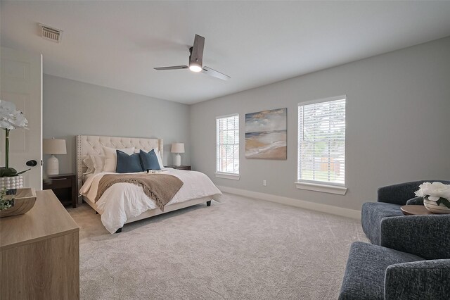 5615 Haven Point Dr, Houston, TX 77084 - bedroom with light carpet, baseboards, and ceiling fan