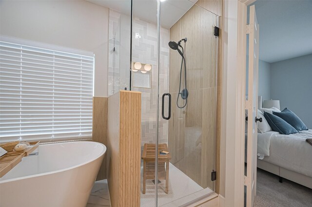 5615 Haven Point Dr, Houston, TX 77084 - ensuite bathroom with a soaking tub and a stall shower