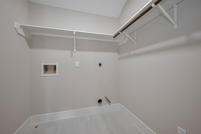 5615 Haven Point Dr, Houston, TX 77084 - laundry room featuring electric dryer hookup, washer hookup, and baseboards