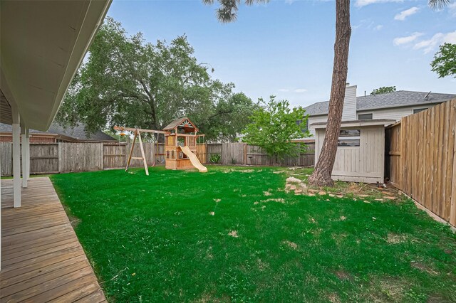 5615 Haven Point Dr, Houston, TX 77084 - view of yard featuring a playground and a deck