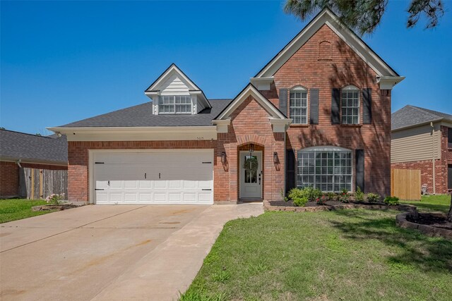 5615 Haven Point Dr, Houston, TX 77084 - traditional-style home with brick siding, concrete driveway, a garage, and a shingled roof
