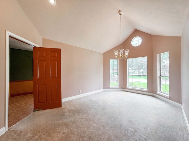 1507 N 24th St, Nederland, TX 77627 - unfurnished room featuring carpet flooring, a chandelier, baseboards, and high vaulted ceiling
