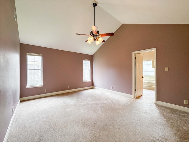 1507 N 24th St, Nederland, TX 77627 - empty room featuring ceiling fan, lofted ceiling, light colored carpet, and baseboards
