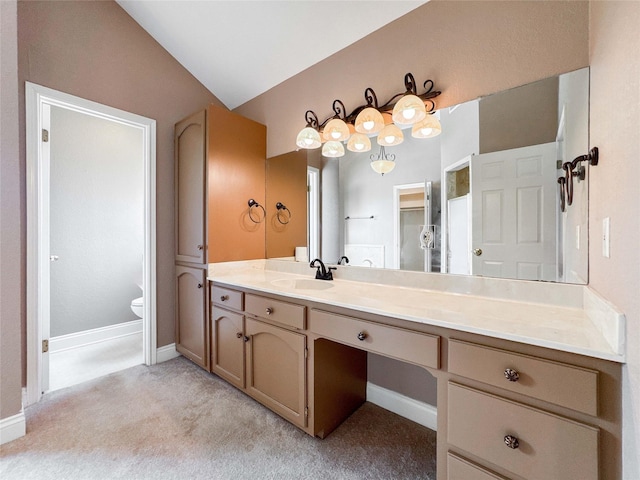 1507 N 24th St, Nederland, TX 77627 - full bathroom with vanity, toilet, lofted ceiling, baseboards, and carpet floors