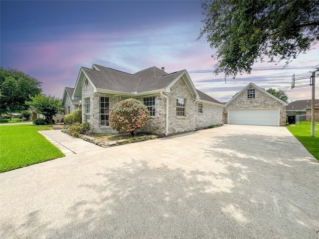 1507 N 24th St, Nederland, TX 77627 - view of front facade with driveway, a garage, a yard, and roof with shingles