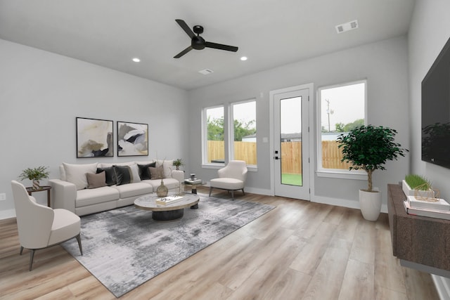 6817 Peerless St, Houston, TX 77021 - living room featuring light wood finished floors, recessed lighting, and a ceiling fan