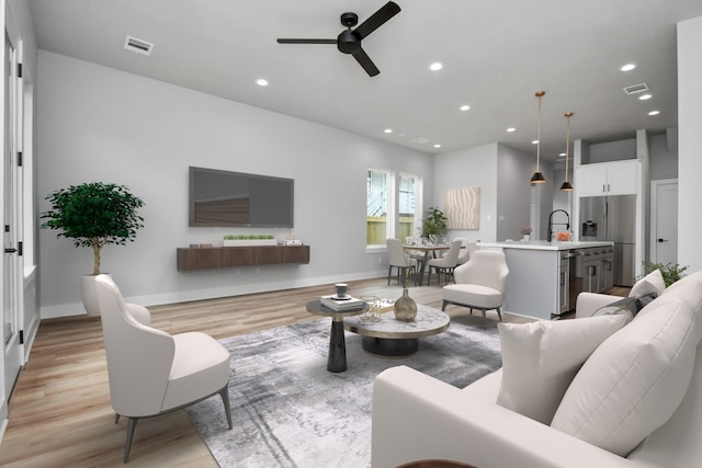 6817 Peerless St, Houston, TX 77021 - living area featuring ceiling fan, light wood-style floors, and recessed lighting