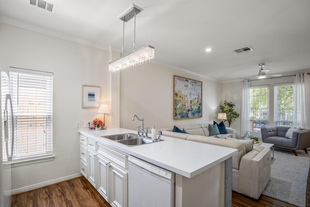 2703 Jackson St, Houston, TX 77004 - kitchen with dishwasher, a peninsula, a sink, open floor plan, and crown molding