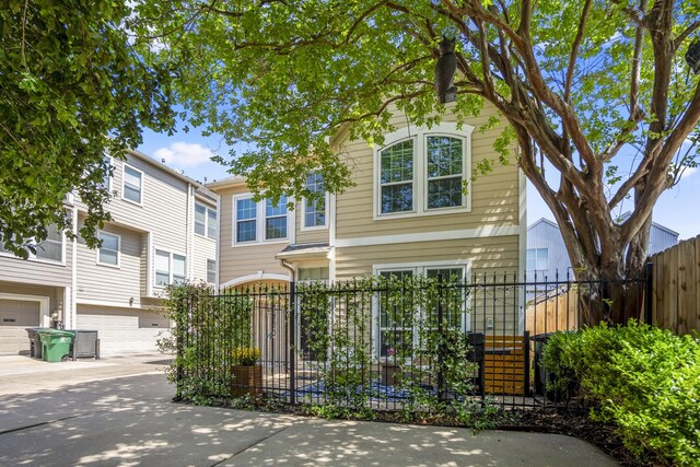 2703 Jackson St, Houston, TX 77004 - view of front of house with an attached garage and concrete driveway