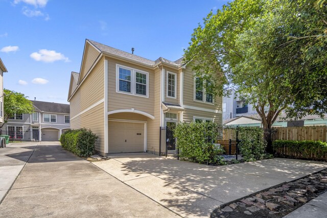 2703 Jackson St, Houston, TX 77004 - view of front of house featuring an attached garage and driveway