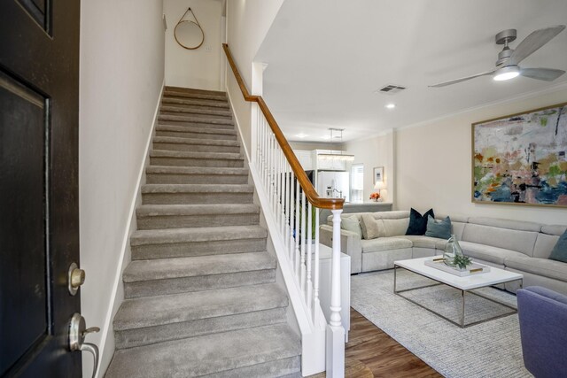 2703 Jackson St, Houston, TX 77004 - staircase featuring ceiling fan, wood finished floors, crown molding, and recessed lighting