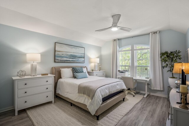 2703 Jackson St, Houston, TX 77004 - bedroom featuring vaulted ceiling, light wood-style floors, baseboards, and ceiling fan