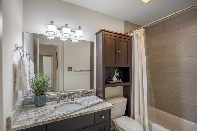 2703 Jackson St, Houston, TX 77004 - full bath featuring vanity, toilet, and shower / bath combo with shower curtain
