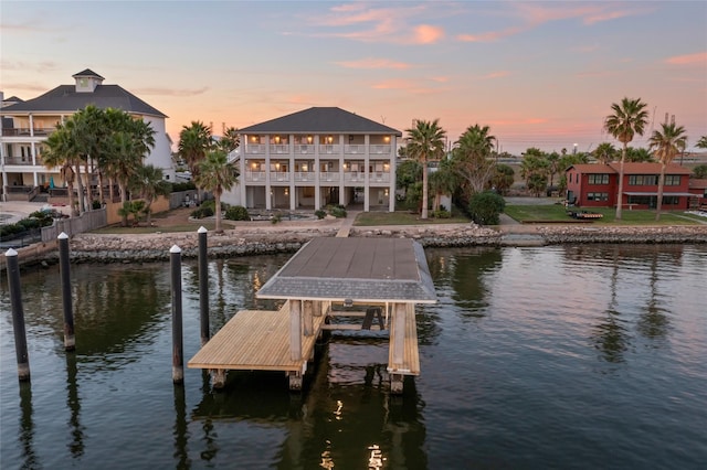 7123 Broadway St, Galveston, TX 77554 - dock area with a water view, boat lift, and a yard