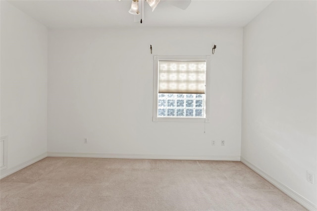 7123 Broadway St, Galveston, TX 77554 - unfurnished room with carpet, ceiling fan, and baseboards