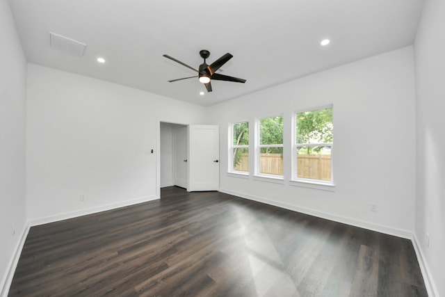 7430 Avenue E Ave E, Beasley, TX 77417 - unfurnished room with dark wood-style floors, baseboards, a ceiling fan, and recessed lighting