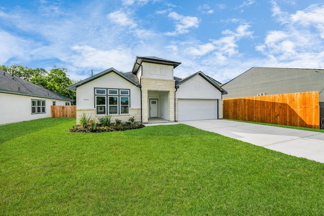 7430 Avenue E Ave E, Beasley, TX 77417 - view of front of property with stone siding, driveway, stucco siding, and a garage