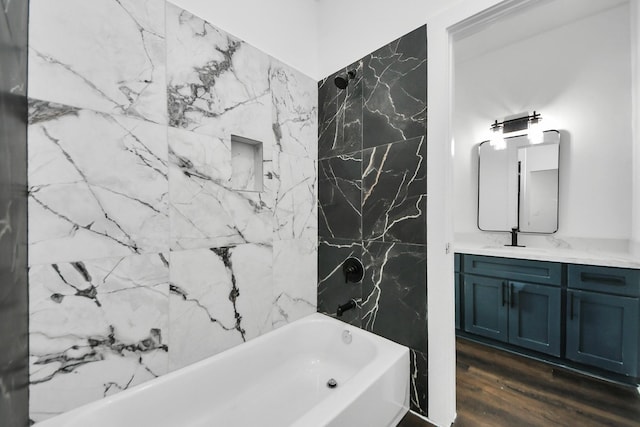 7430 Avenue E Ave E, Beasley, TX 77417 - full bath featuring vanity, shower / washtub combination, and wood finished floors