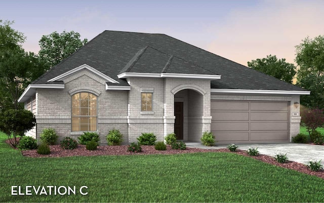 418 Riesling Dr, Alvin, TX 77511 - french country inspired facade featuring brick siding, a garage, concrete driveway, roof with shingles, and a front lawn