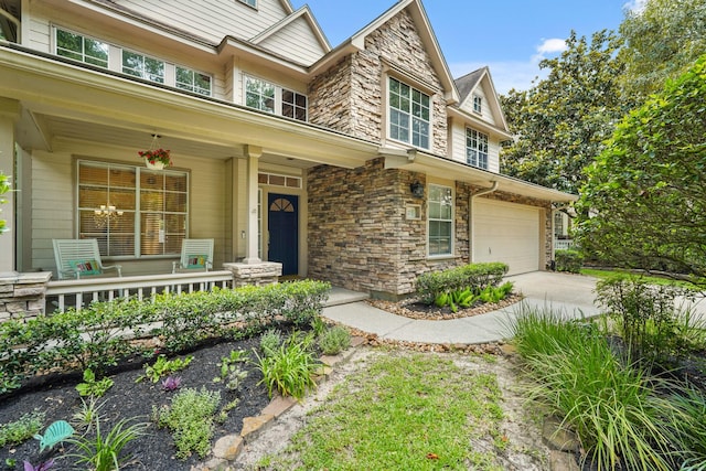 82 Lightwood Trce, Spring, TX 77382 - craftsman inspired home featuring covered porch, stone siding, and driveway