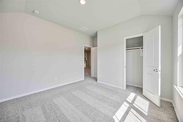 1497 Rd 66114, Dayton, TX 77535 - unfurnished bedroom with lofted ceiling, carpet, and a closet