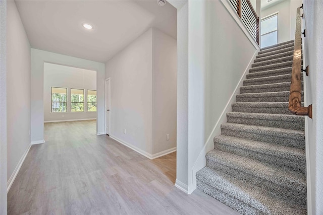 1497 Rd 66114, Dayton, TX 77535 - stairs featuring wood finished floors and baseboards