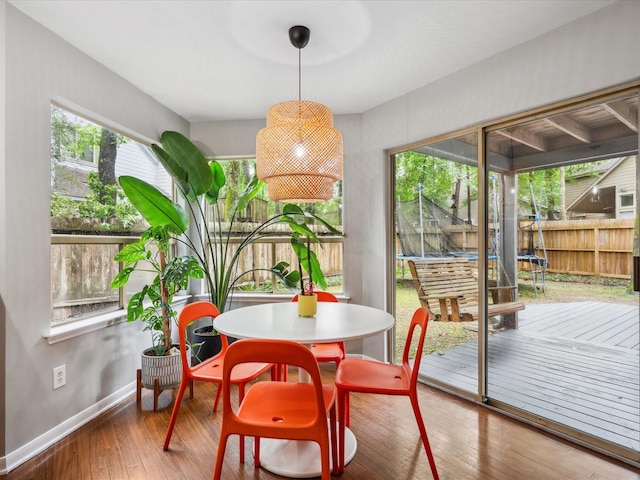 10 Leaf Trace Ct, The Woodlands, TX 77381 - dining area with hardwood / wood-style floors and baseboards