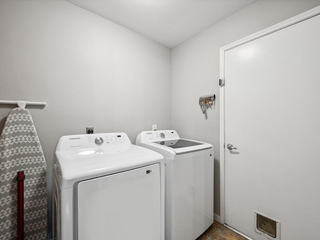 10 Leaf Trace Ct, The Woodlands, TX 77381 - washroom with washing machine and dryer