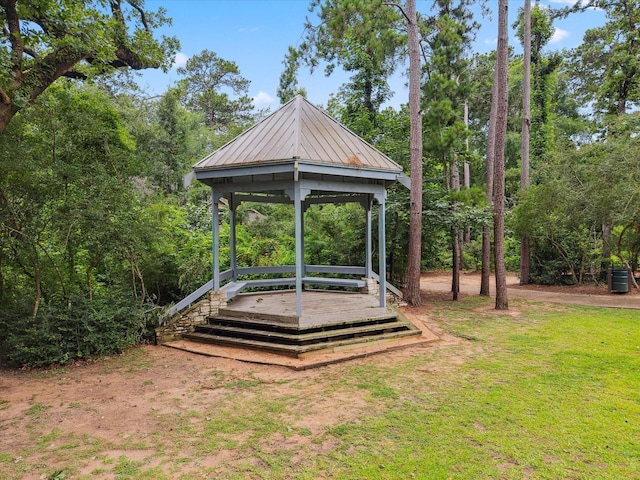 10 Leaf Trace Ct, The Woodlands, TX 77381 - view of grassy yard featuring a gazebo and a wooden deck