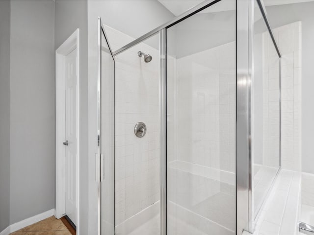 10 Leaf Trace Ct, The Woodlands, TX 77381 - full bath featuring a shower stall and baseboards