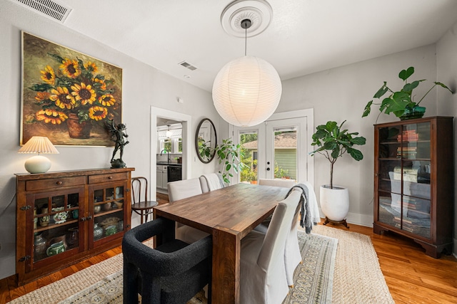 1039 Louise St, Houston, TX 77009 - dining area featuring light wood-type flooring