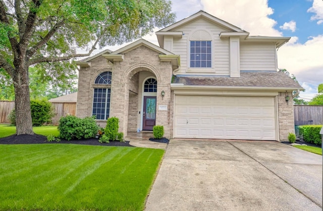 3002 Trinity Pass Ct, Spring, TX 77373 - traditional-style home with an attached garage, driveway, and brick siding