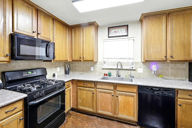 3002 Trinity Pass Ct, Spring, TX 77373 - kitchen with black appliances, decorative backsplash, dark wood-style floors, and light countertops