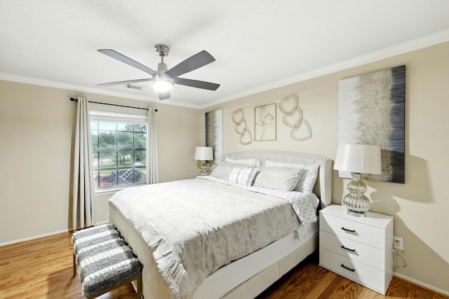 3002 Trinity Pass Ct, Spring, TX 77373 - bedroom with ornamental molding, wood finished floors, and a ceiling fan