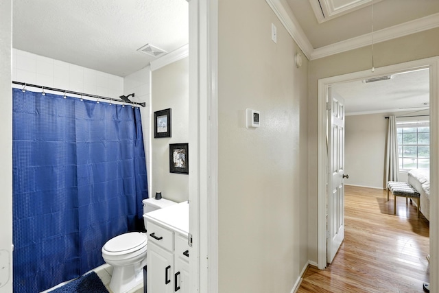 3002 Trinity Pass Ct, Spring, TX 77373 - full bathroom featuring wood finished floors, a shower with shower curtain, crown molding, and vanity