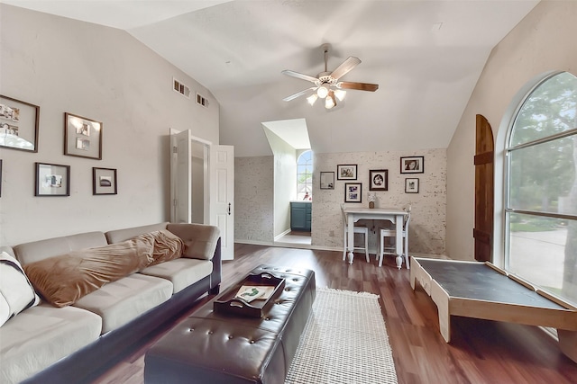 14222 Autumn Mist, Cypress, TX 77429 - living area with vaulted ceiling, ceiling fan, and wood finished floors