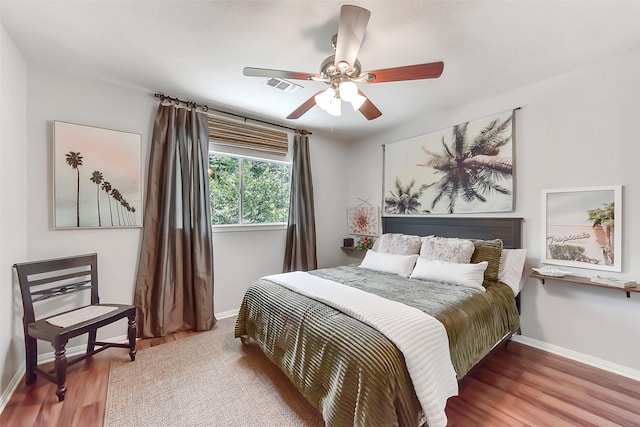 14222 Autumn Mist, Cypress, TX 77429 - bedroom featuring wood finished floors, baseboards, and ceiling fan