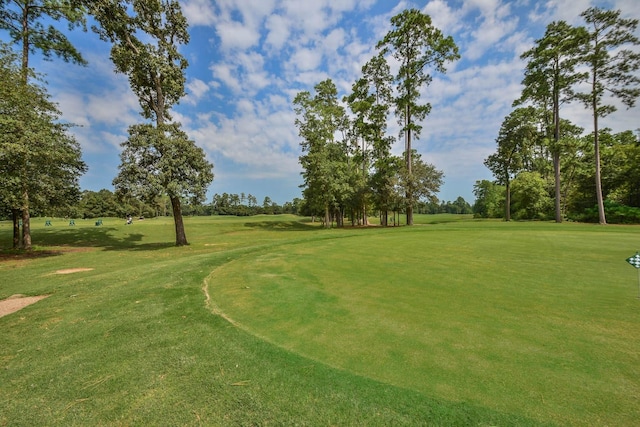 14222 Autumn Mist, Cypress, TX 77429 - surrounding community with view of golf course, view of scattered trees, and a lawn
