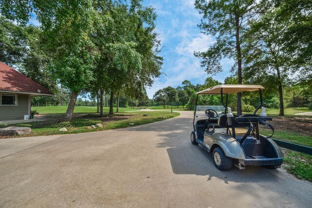 14222 Autumn Mist, Cypress, TX 77429 - view of home's community with a carport and a yard