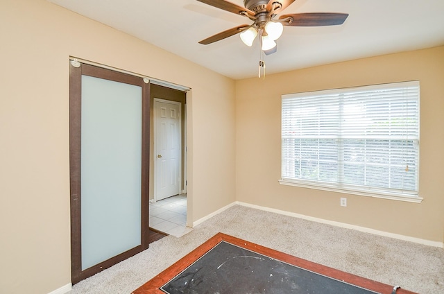 7811 Holly Berry Ct, Cypress, TX 77433 - carpeted empty room with ceiling fan and baseboards