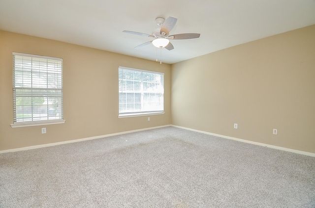7811 Holly Berry Ct, Cypress, TX 77433 - carpeted spare room with plenty of natural light, ceiling fan, and baseboards