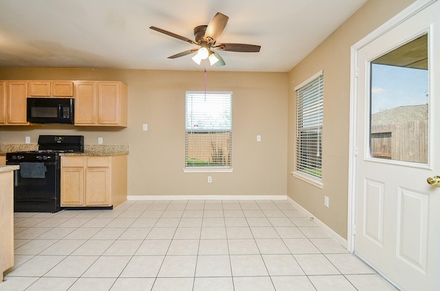 7811 Holly Berry Ct, Cypress, TX 77433 - kitchen featuring black appliances, light brown cabinets, a ceiling fan, and baseboards