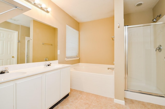7811 Holly Berry Ct, Cypress, TX 77433 - full bathroom featuring a shower stall, a garden tub, and double vanity