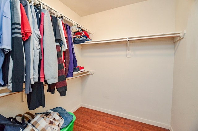 7811 Holly Berry Ct, Cypress, TX 77433 - spacious closet featuring wood finished floors